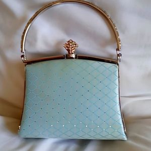 Vintage light blue formal purse.
